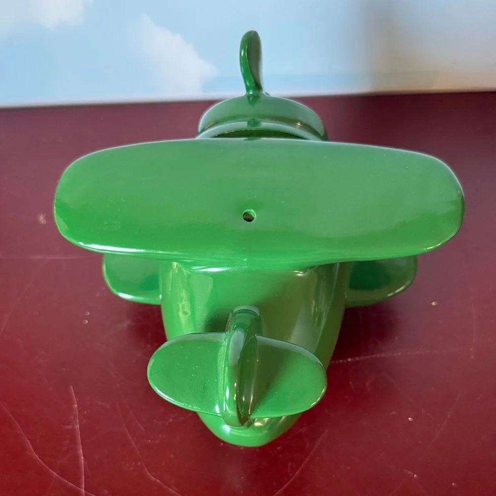 Vintage Green piggy bank Airplane
